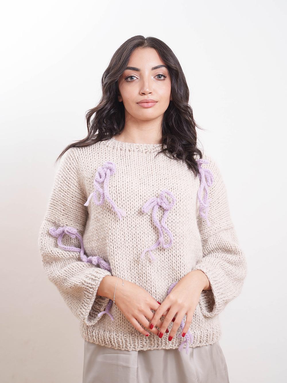 Tricot à Porter Maglia giro fiocchi applicati Vendita Economica