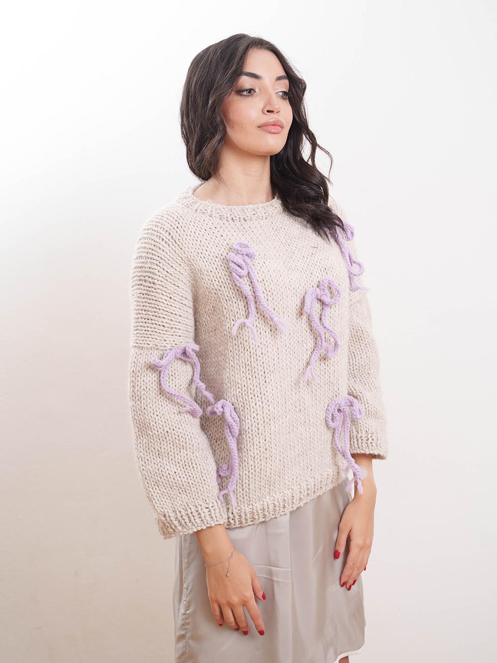 Tricot à Porter Maglia giro fiocchi applicati Vendita Economica